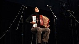 Mayra Elide performs at the 2017 International Womxn's Day Celebration