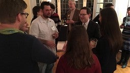 President Schill talks with new faculty members 