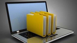Laptop with paper files