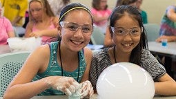 Girls presenting science project