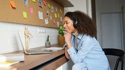 Student using laptop for meeting