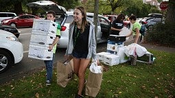 Volunteers helping on move-in day 2015.