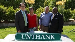 From left: UO President Michael Schill, Libby Unthank Tower (DeNorval Unthank's daughter), Otto Poticha and Greg Evans.