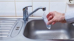 Filling test tube from water faucet