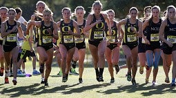 Ducks women cross-country runners during a meet
