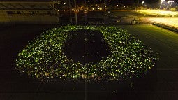 Students forming the O
