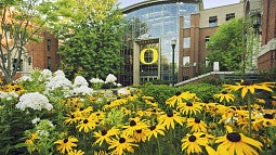 Lillis Business Complex with flowers in the foreground 