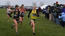 Senior Maggie Schmaedick crosses the finish line