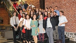 Student group posing on stairway