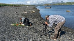 Mark Blaine filming a documentary scene