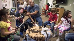 Children learning drumming