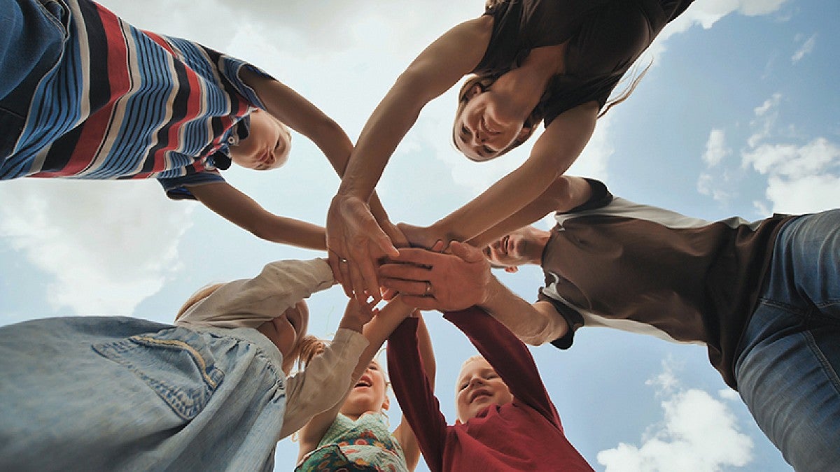 Children holding hands in a circle