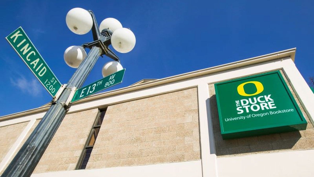 Kincaid Street and 13th Avenue street signs in front of The Duck Store