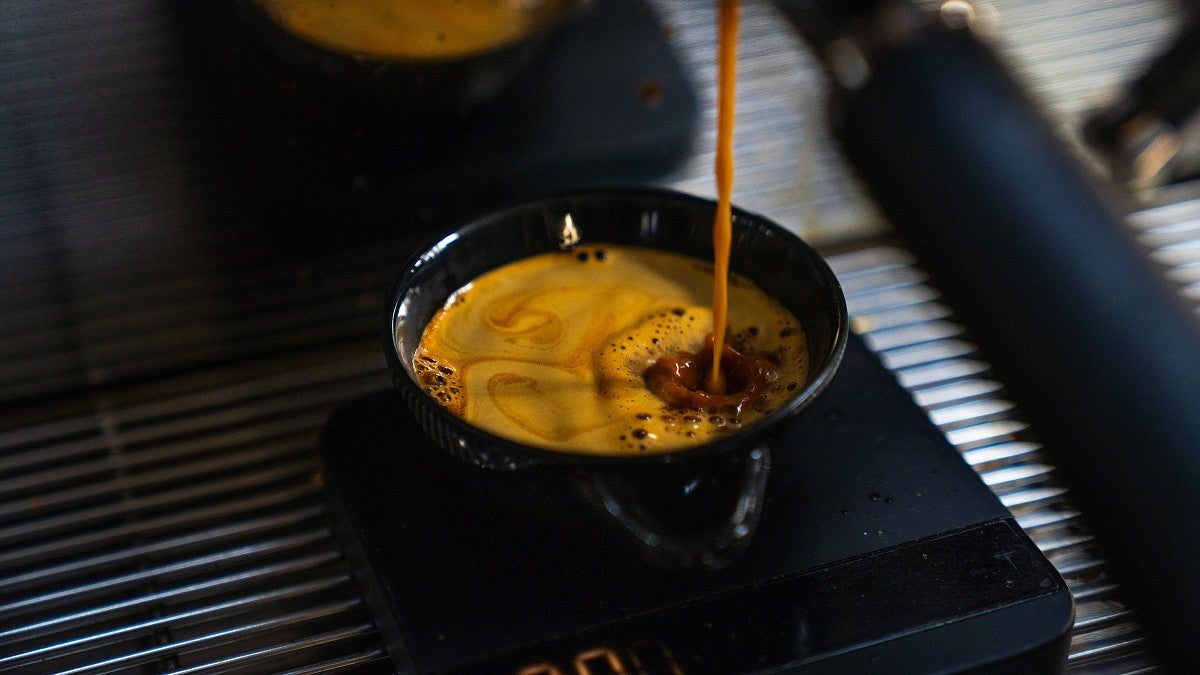 Pouring a cup of espresso