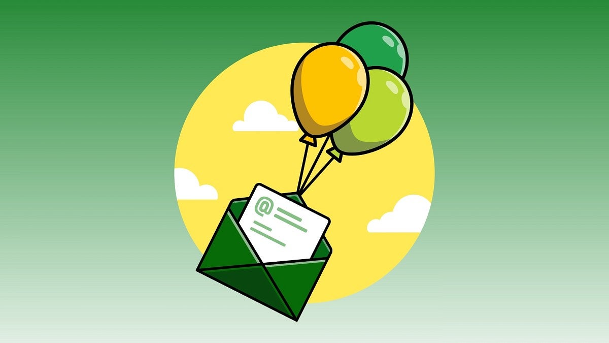 green and yellow balloons carrying green envelope