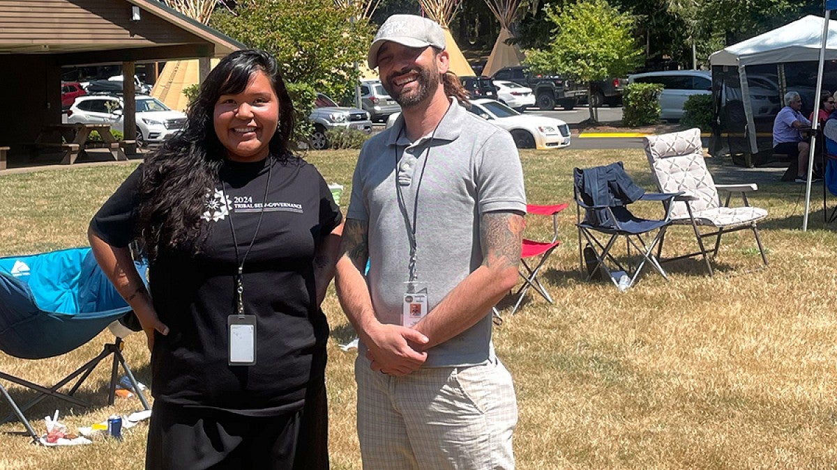 UO Law student Clark Barlowe with a female member of the Confederated Tribe of Siletz Indians