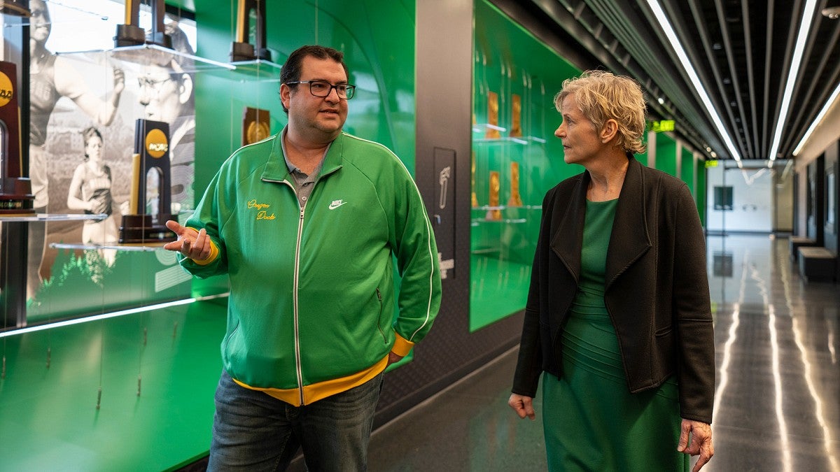 Sports business instructor Yoav Dubinsky and marketing professor T. Bettina Cornwell in Hayward Hall