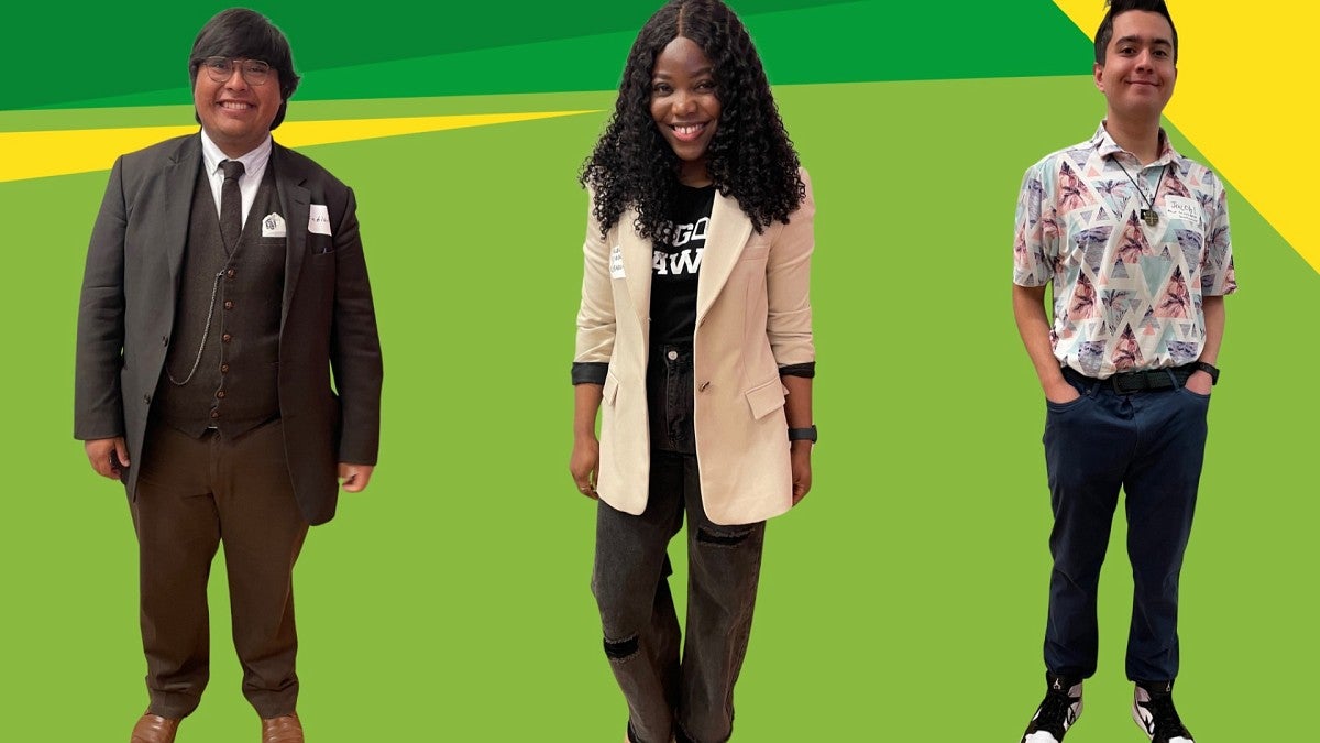 three students wearing interview-ready business clothing