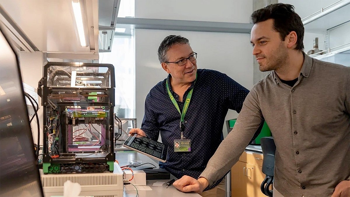 Paul Dalton, left, and Ievgenii Liashenko in their lab