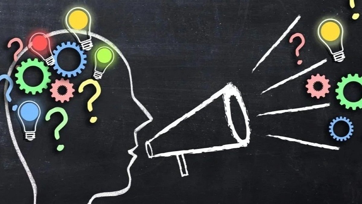 chalk drawing of person with megaphone