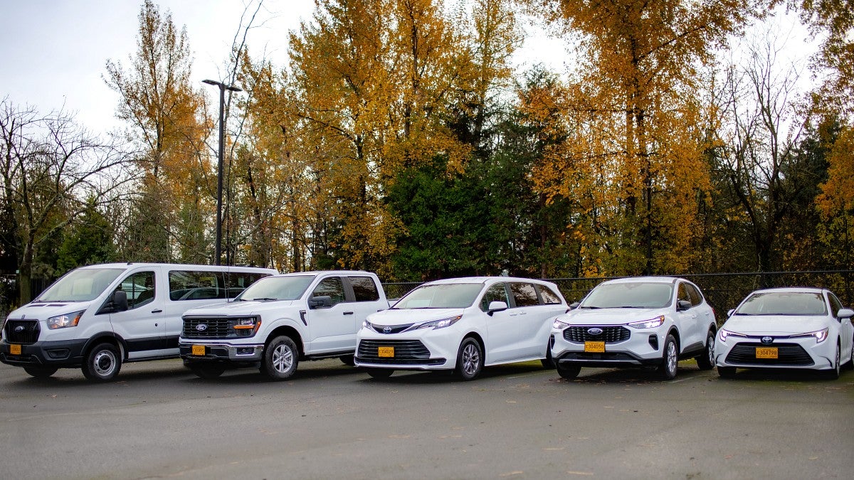 The motor pool fleet includes (from left) 21 Ford 12-passenger vans, four Ford F-150 pickup trucks, four Toyota Sienna hybrid minivans, six Ford all-wheel drive Escape SUVs and six Toyota Corolla hybrid sedans