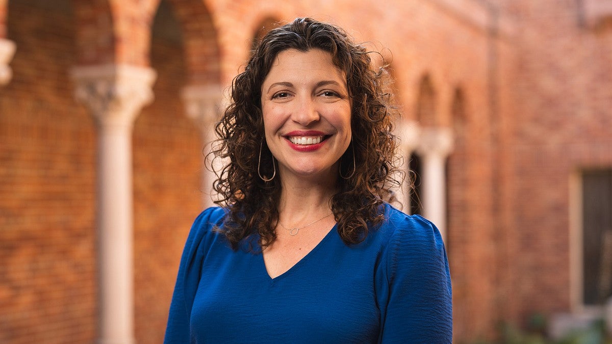 Olivia Miller in the art museum courtyard