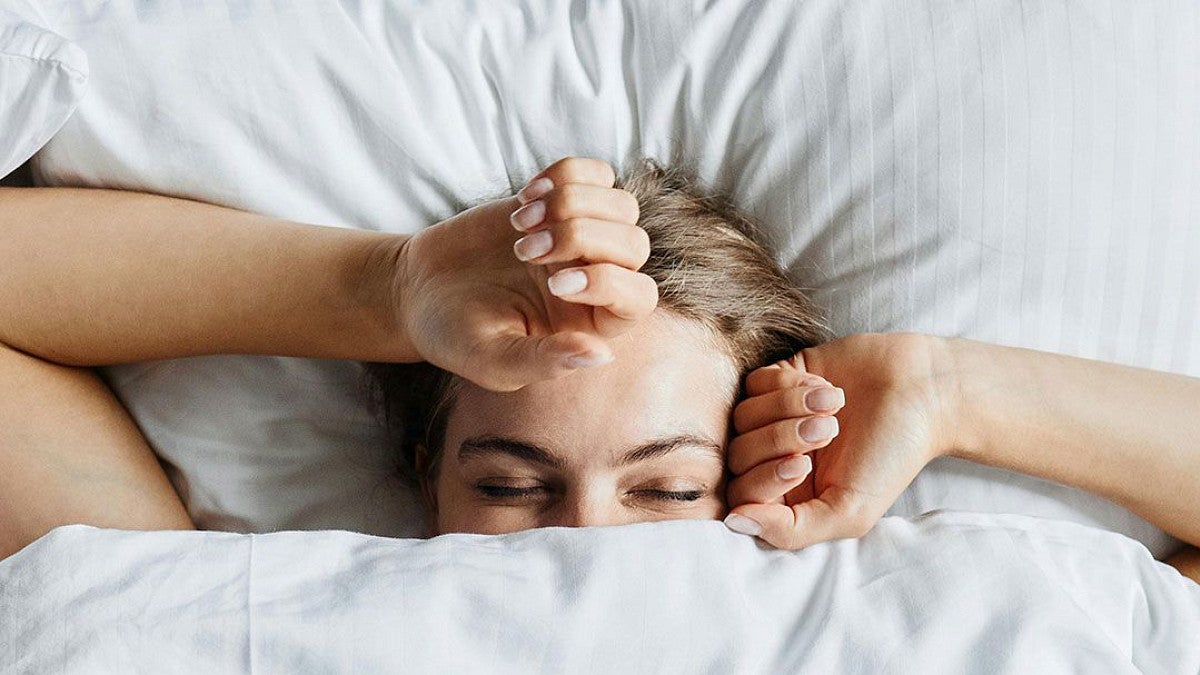 Woman sleeping in bed