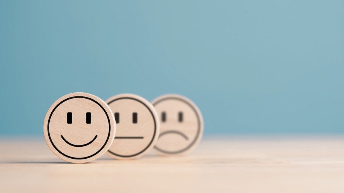 smiling and frowning face icons