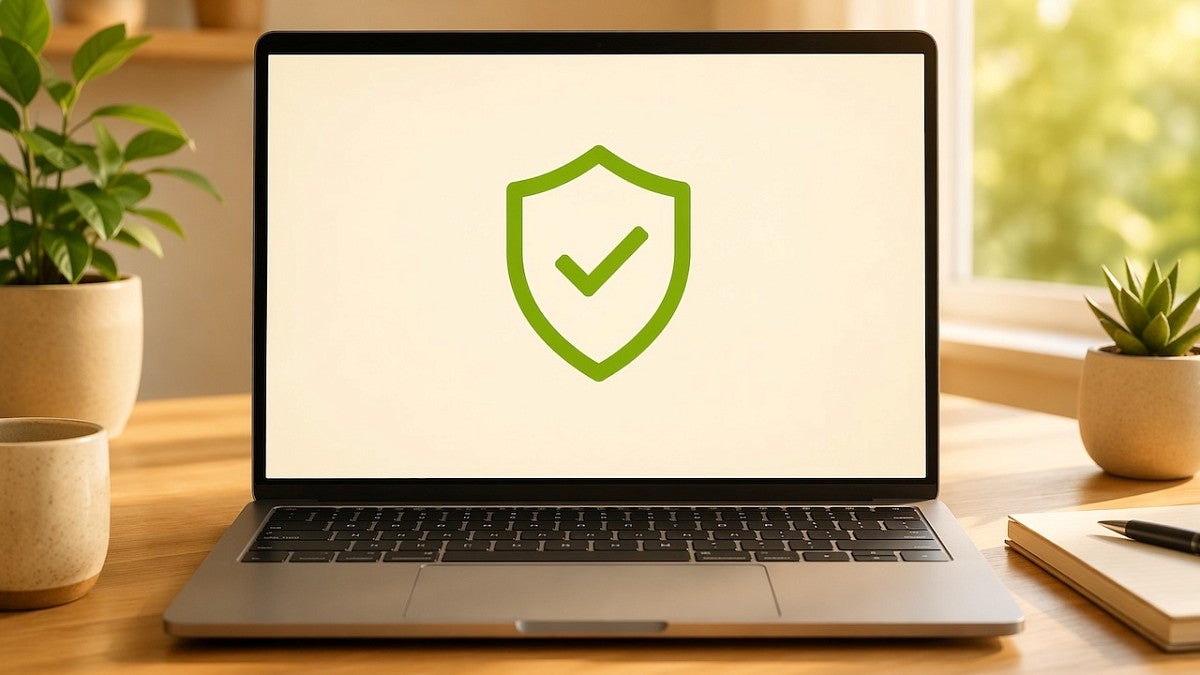 Laptop with green shield icon, representing enterprise data protection in Microsoft Copilot