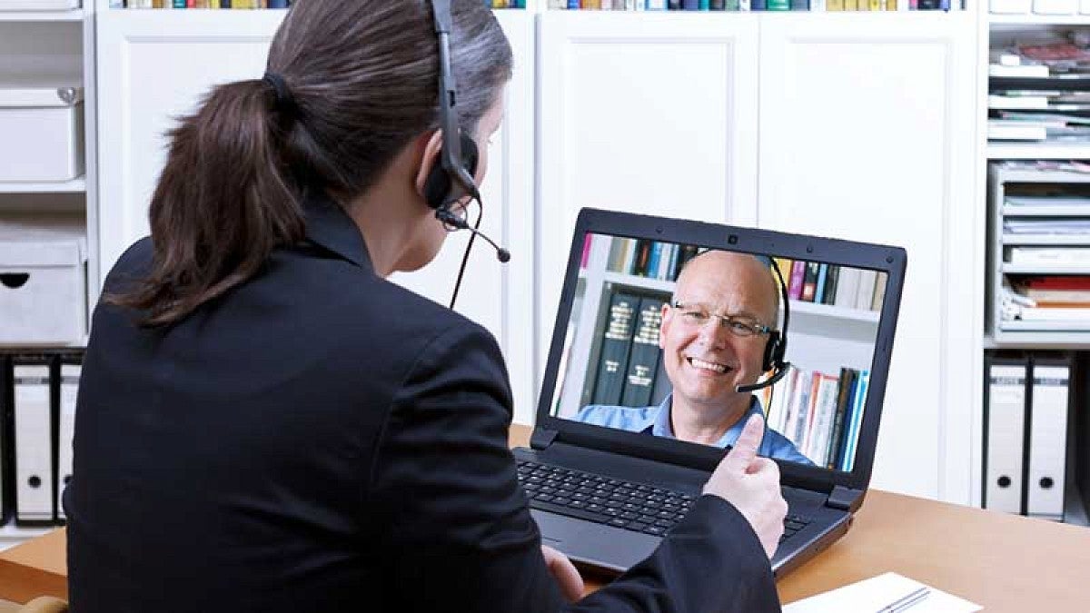 Student with headset in online class