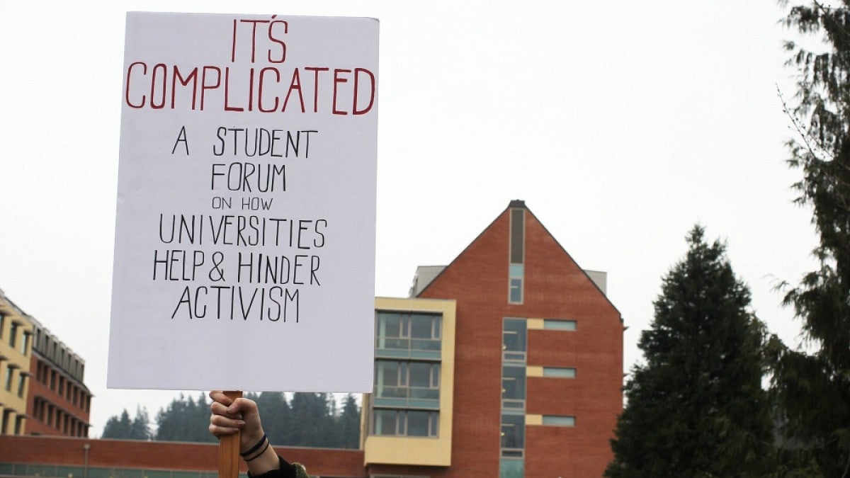 Protest sign with information about the activism forum