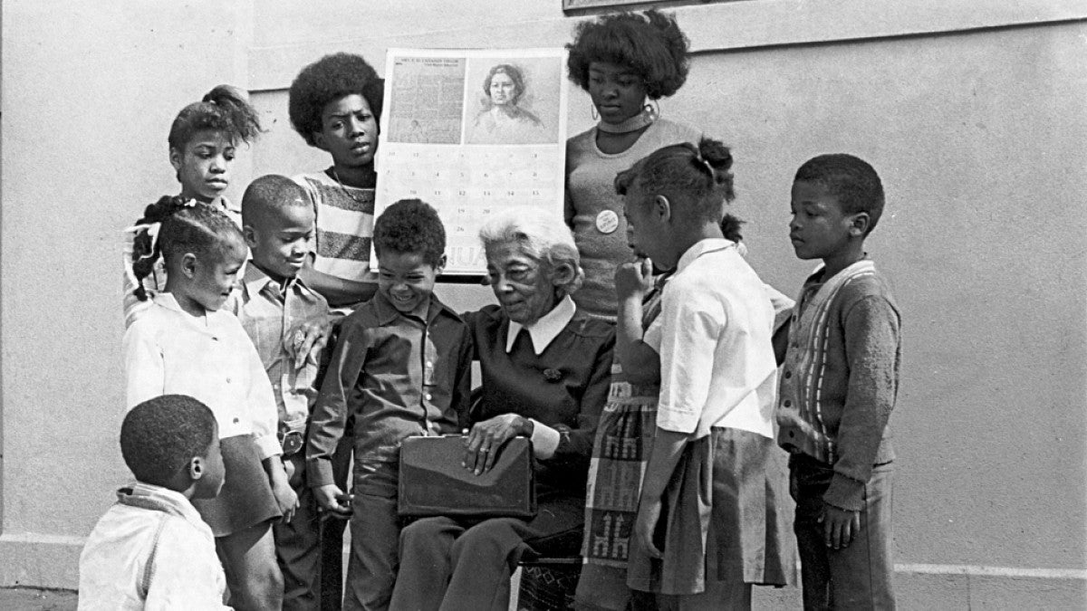 Beatrice Cannady with schoolchildren