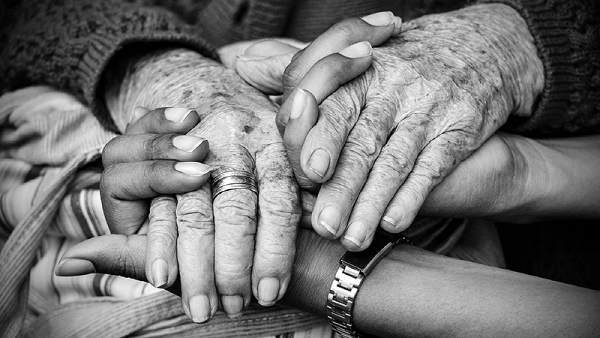 Hands of elderly people