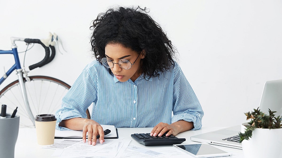 Woman paying bills