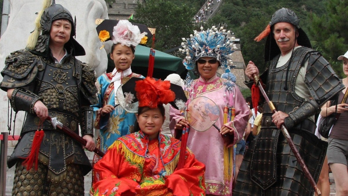 UO student Ming Canaday (center) with her parents and others at the Great Wall of China