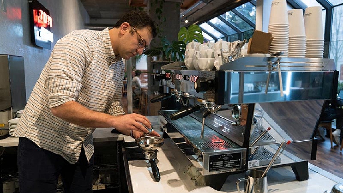 Christopher Hendon prepares espresso shot