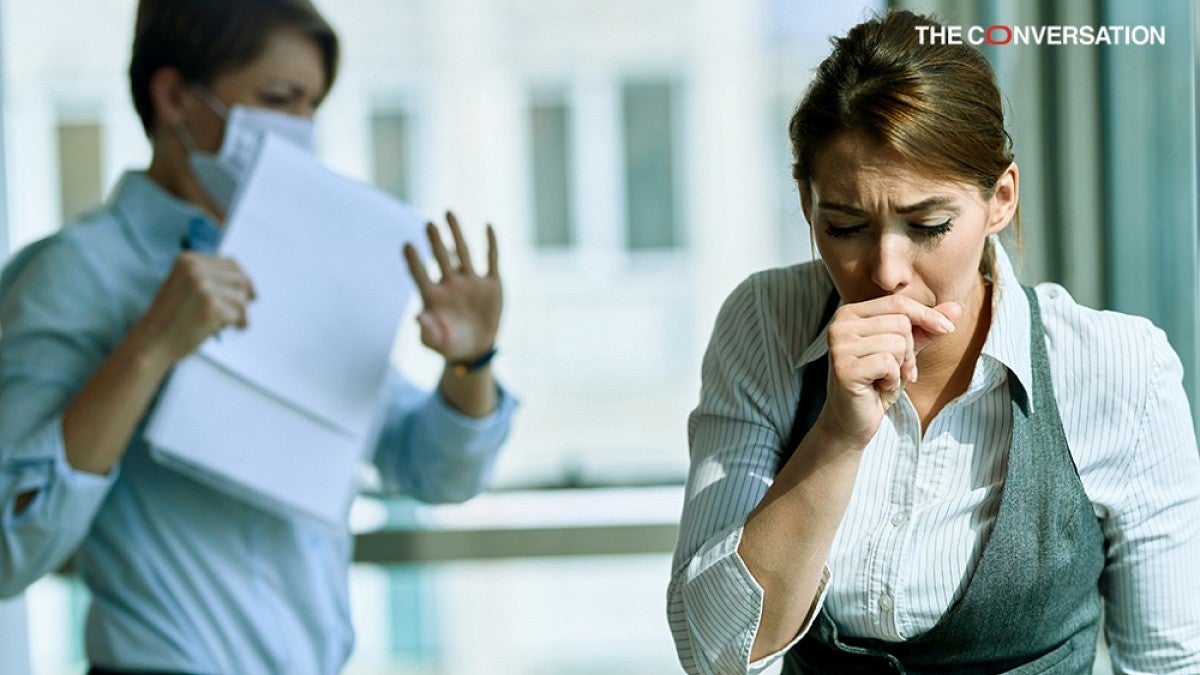 Office worker coughing