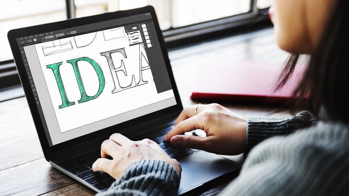 Laptop with Creative Cloud