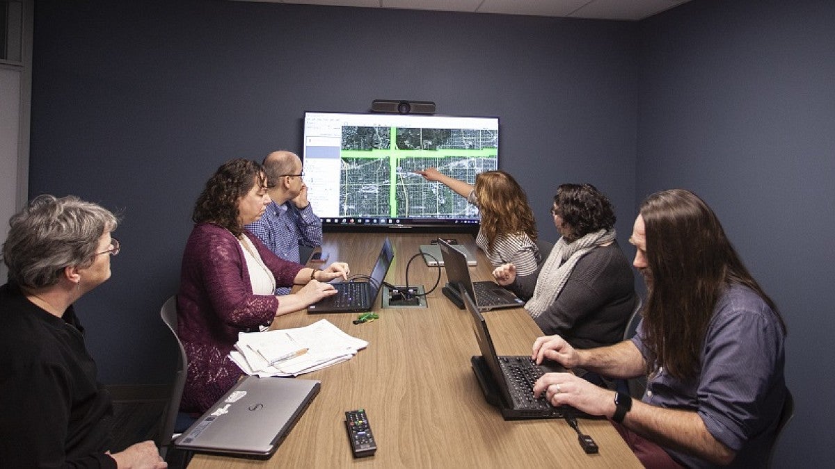 Group working in the DREAM Lab collaboration room.