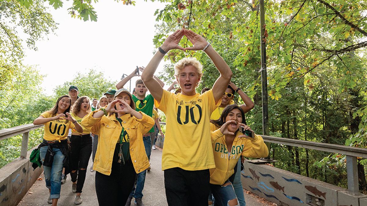 Students throwing the O