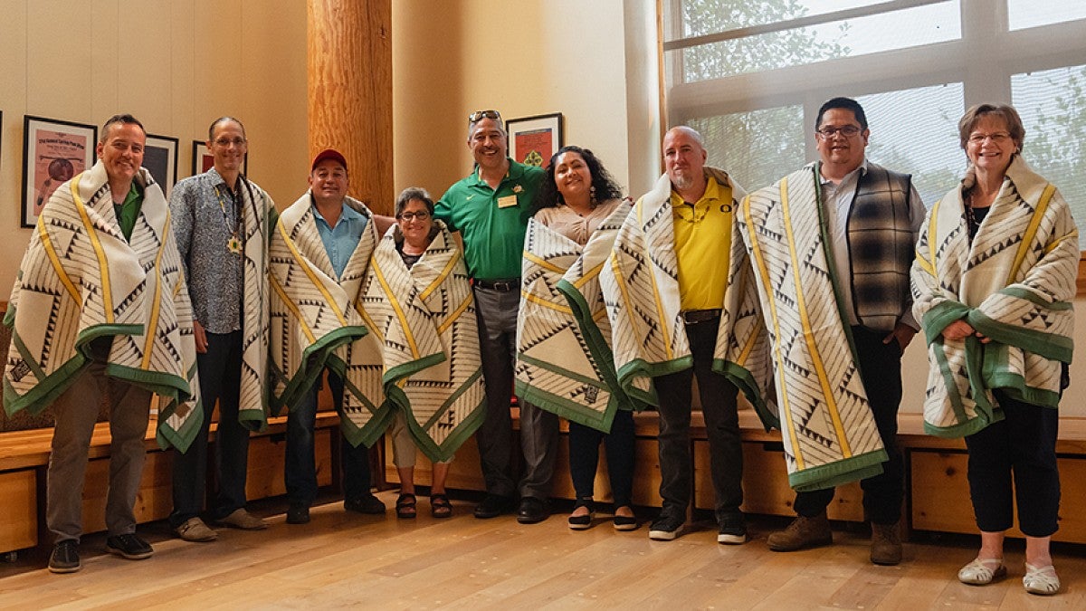 Tribal representatives with Home Flight blankets