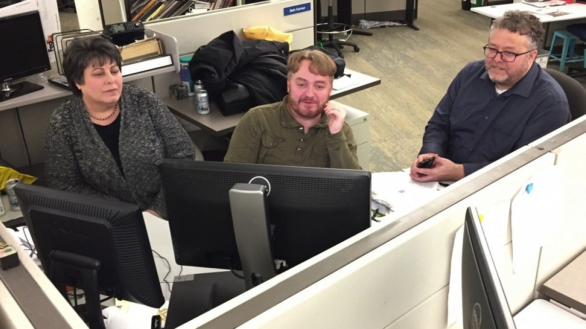 Lewis Kamb (middle) and Jim Brunner (right)