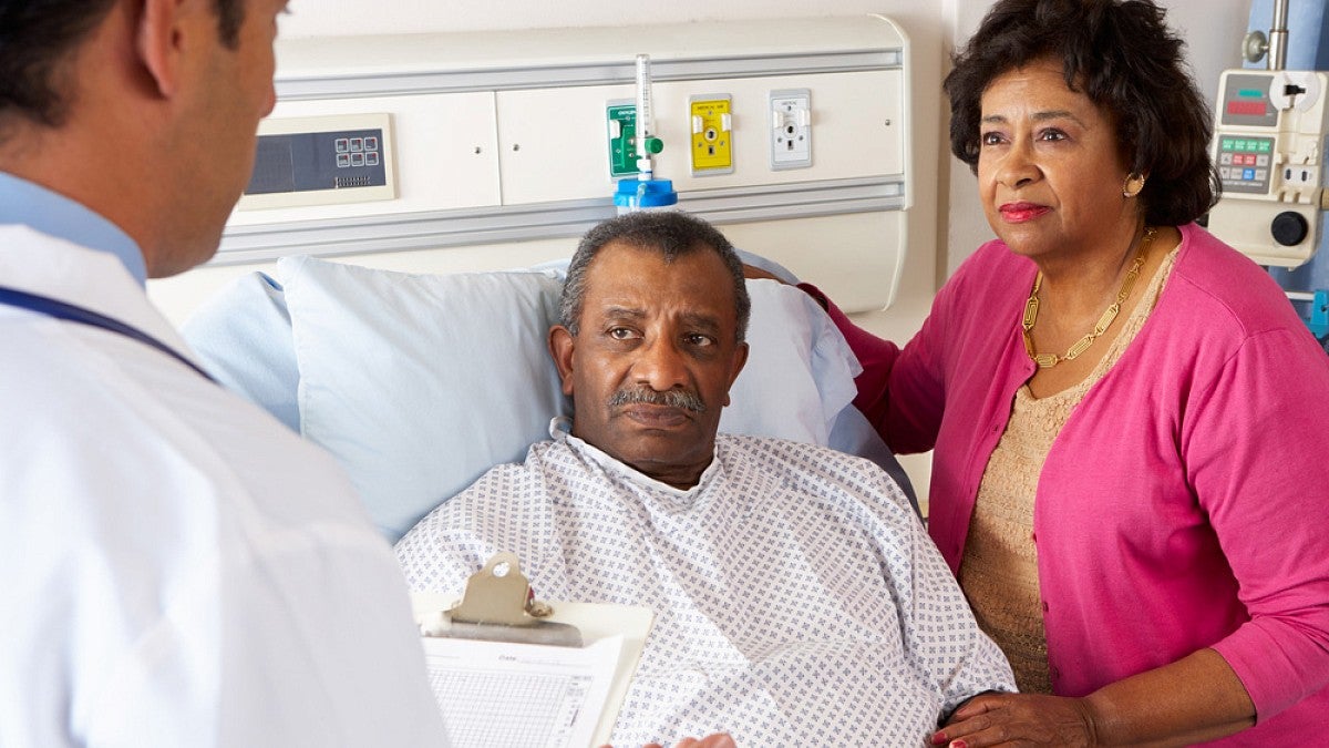 Doctor talking with patient