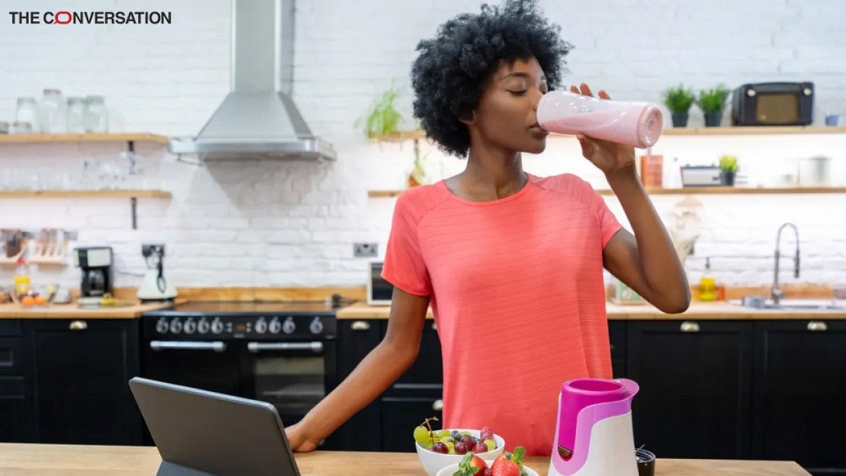 Woman drinking protein shake