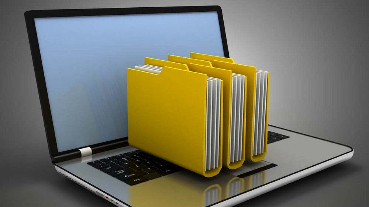 Laptop with paper files
