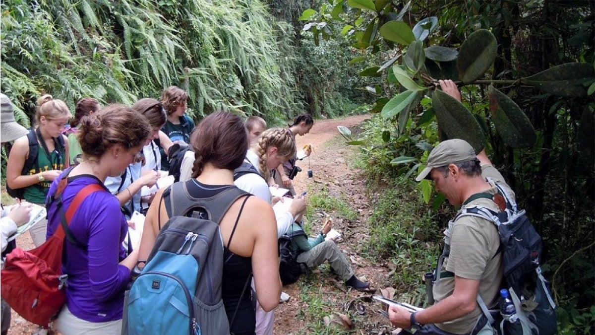 UO professor Peter Wetherwax with a class in Ecuador.