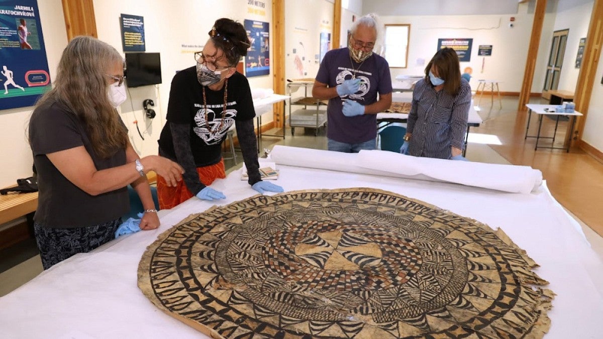 Researchers looking at tapa cloth