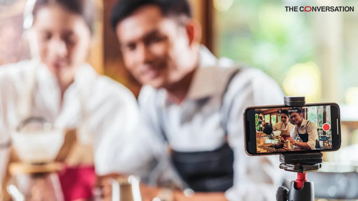 Workers making TikTok video