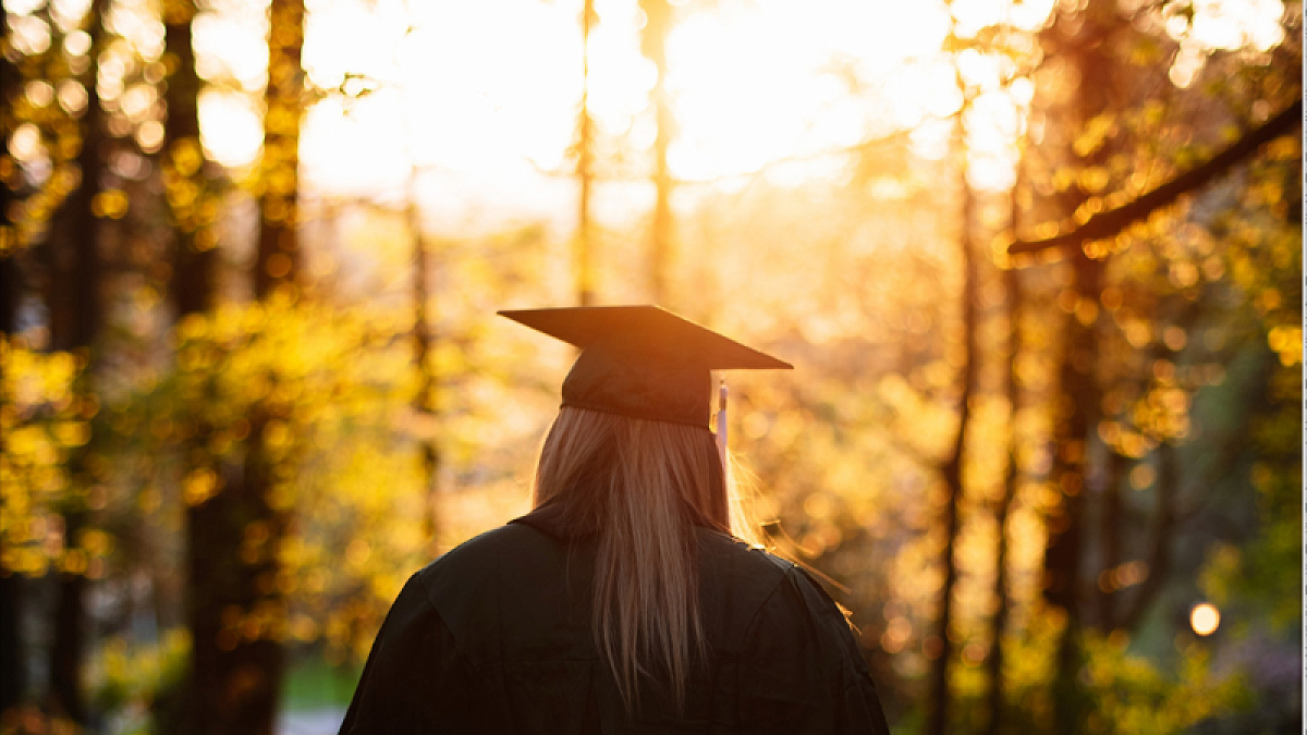 Back of student wearing cap and gown 