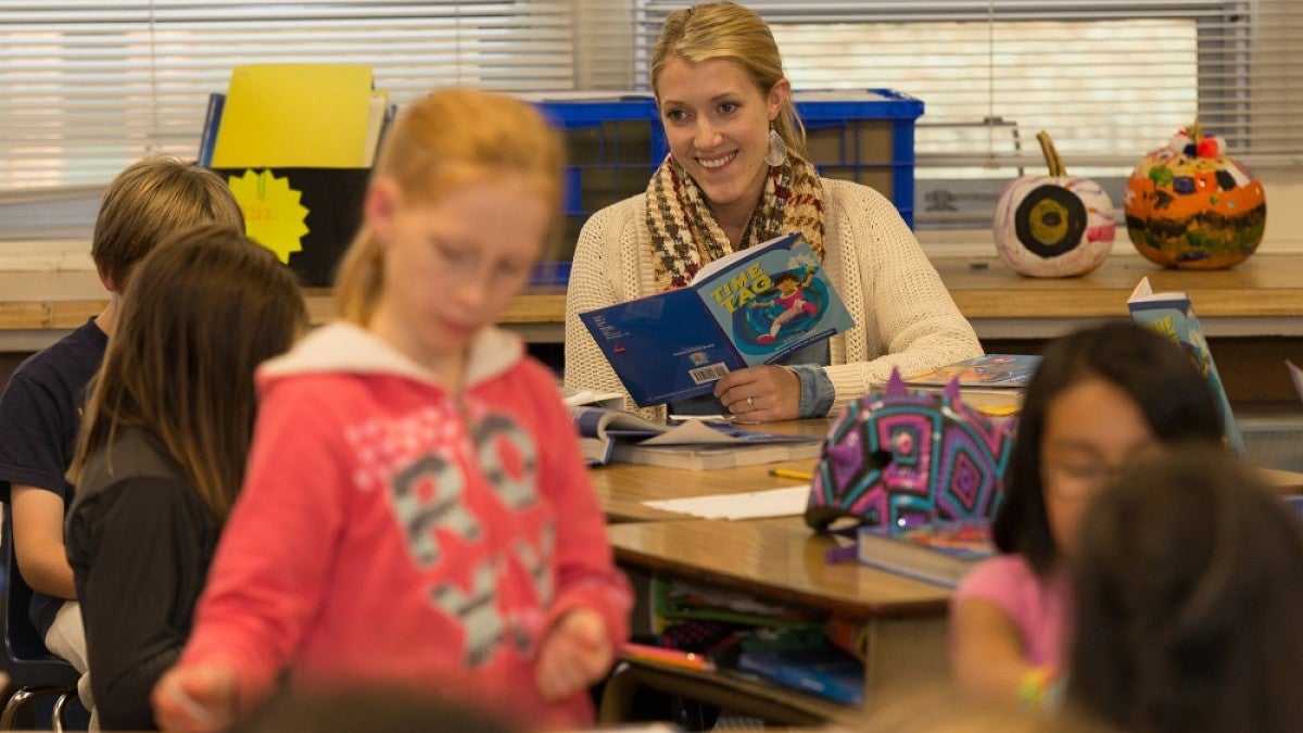 Lauren Boettger, a 2014 graduate, teaching at Fairfield Elementary.